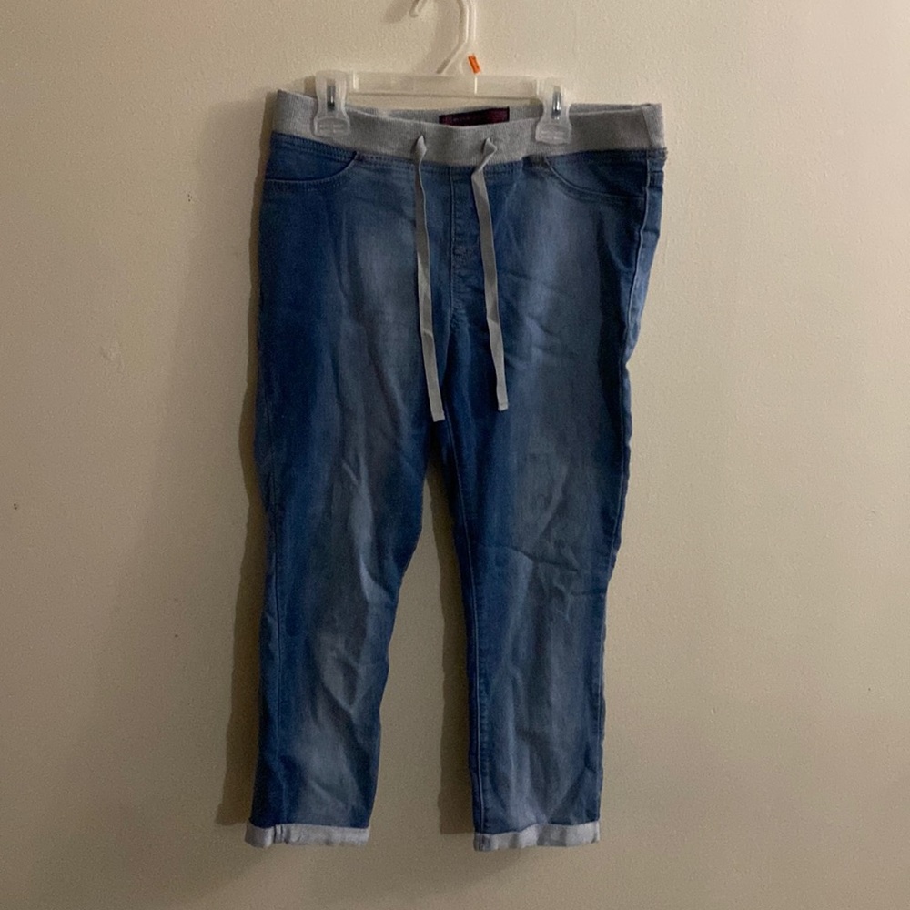 Medium washed jeans, rolled up